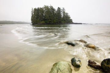 Small island on Long Beach in Tofino, Vancouver Island, Canada - 502948270