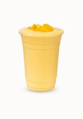 Fresh Mango ripe organic yellow smoothie honey mix in plastic glass, Garnish.  Isolated on white background. Ripe mangoes are popular all over world. Perfect for summer drink. Healthy food.