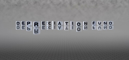 depreciation fund word or concept represented by black and white letter cubes on a grey horizon background stretching to infinity