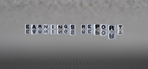 earnings report word or concept represented by black and white letter cubes on a grey horizon background stretching to infinity