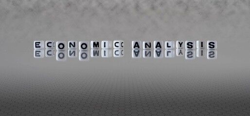 economic analysis word or concept represented by black and white letter cubes on a grey horizon background stretching to infinity