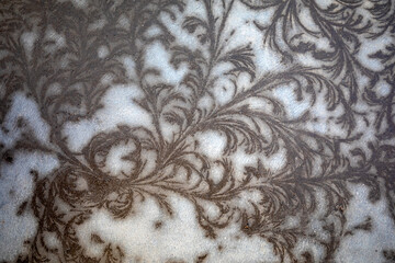 Pattern on cement floor, under low temperature and natural conditions
