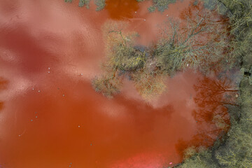 Aerial view of bloody red dyed pond in Vilnius near Russian embassy, Lithuania