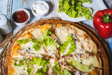 Italian pizza with chicken and vegetable. Top view