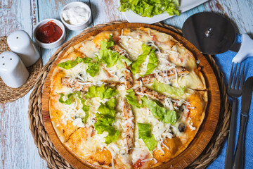Italian pizza with chicken and vegetable. Top view