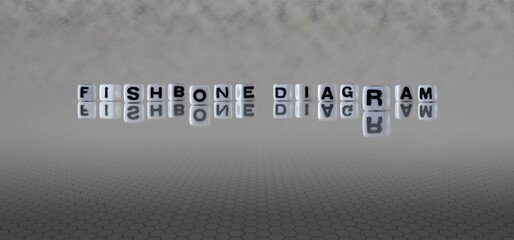 fishbone diagram word or concept represented by black and white letter cubes on a grey horizon background stretching to infinity