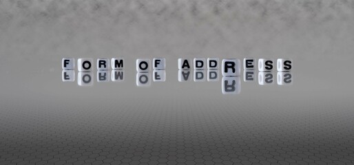 form of address word or concept represented by black and white letter cubes on a grey horizon background stretching to infinity