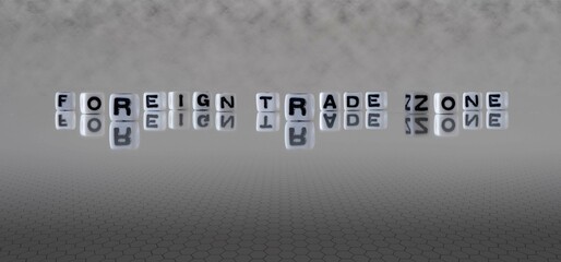 foreign trade zone word or concept represented by black and white letter cubes on a grey horizon...