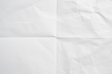 White folded and wrinkled paper texture background