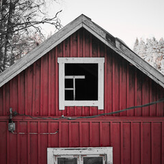 White and red winter sky and landscape nordic landscape white snow and red house barn.