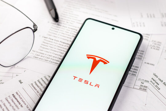 West Bangal, India - April 20, 2022 : Tesla on phone screen stock image.