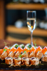 sushi and wine on the table