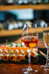 sushi and wine on the table
