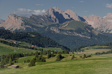 North-east view of Puez-Odle Nature park with Seceda, Fermeda di Sotto & Sass Rigas mountains, as seen from Seiser Alm/Alpe di Siusi plateau, Dolomites, Trentino, Alto Adige, South Tyrol, Italy