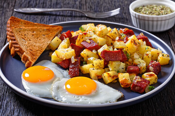 Corned Beef Hash Browns with fried eggs, top view