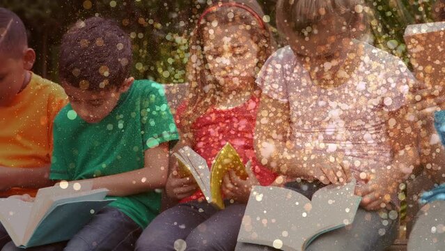 Animation of glowing spots over diverse children reading books