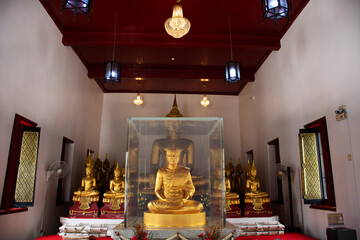 Ancient buddha statues in old ubosot church for thai people travelers travel visit respect praying blessing holy worship in Wat Bot Bon temple at Bang Kruai on March 20, 2022 in Nonthaburi, Thailand
