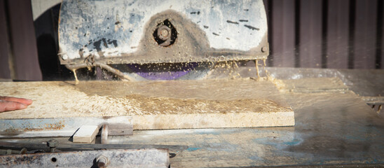 Electric tile cutting machine. Construction. Work