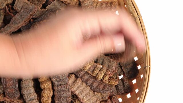 Sun dried acacia concinna fruit. Acacia concinna ,Soap Bobs or Dried shikakai pods in basket. medicinal herbs