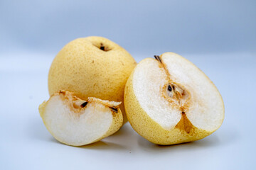 Naklejka na ściany i meble fresh Asian pear fruit on white background