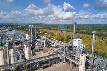 Aerial view of factory with high plant manufacture structure. Global production and manufacturing...