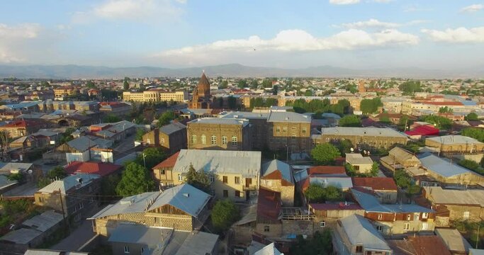 Aerial view Gyumri, Armenia, Caucasus. Drone slowly move up ad show modern and old style buildings. Caucasian typical Post-Soviet City. Gyumri is the second  largest city in Armenia.