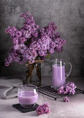 Photography of purple drink and lilacs