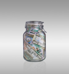 money in glass jar