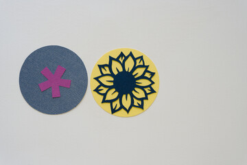 paper flower stencil/cutout and asterisk on paper circles