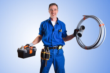 Portrait of uniformed plumber with work tools and isolated background