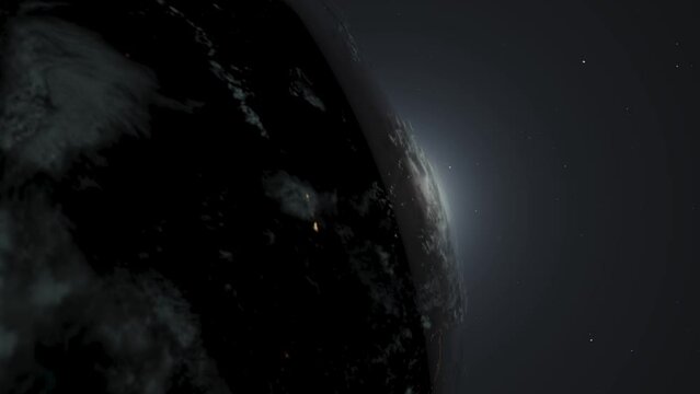 Computer graphics. A night globe with dots of electric light rotates against a dark sky. The concept of technological progress