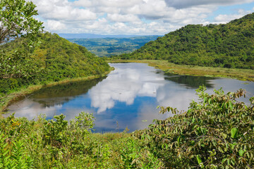 Obraz premium Scenic view of Itende Crater Lake, a crater lake in Mbeya, Tanzania 