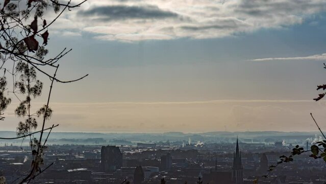 Oststadt of Ulm with churches on dusty morning time lapse