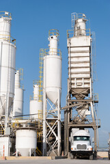 ready-mix concrete transport truck loading concrete in the concrete batching plant