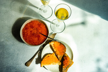 Red trout caviar and sparkling wine