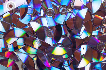 Shredded broken CD's and DVD's. Background