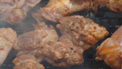 Fresh chicken steak grill meat on fire. Making barbecue on the grill