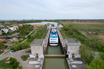 A cruise liner with tourists on board passes through the Volga-Don Shipping Canal named after...
