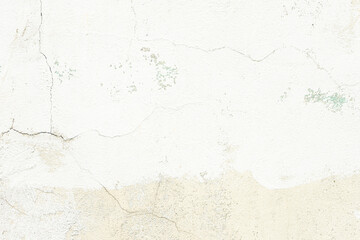 White plaster wall texture with crack background. Pattern of white plaster wall in rough aged structure
