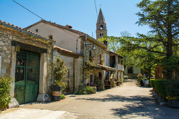 A street of houses and a bar in the historic little medieval village of Roc near Buzet in Istria,...