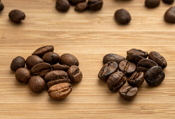 Medium roast and dark roast coffee beans. Macro photography