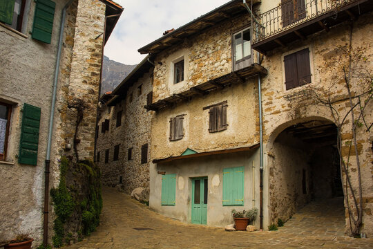 A residential street in Poffabro, an historic medieval village in the Val Colvera valley in Pordenone province, Friuli-Venezia Giulia, north east Italy
