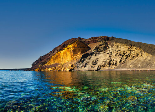The Linosa volcano called Monte Nero in the beach of Cala Pozzolana di Ponente, Sicily