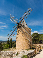 Old stone windmill in Saint Saturnin les Apt, Provence, France - obrazy, fototapety, plakaty