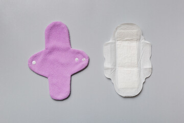 set of colorful bright reusable menstrual pads. zero waste woman periods concept top view with copy space