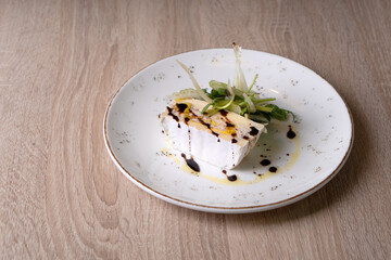 Cheese and nuts appetizer with sauce and salad