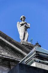 angel statue blue sky
