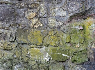  fragment of an old stone wall with traces of paint