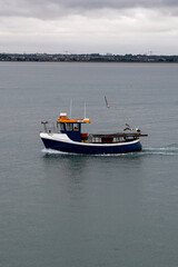 Naklejka premium boats on the river