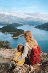 Mother and daughter travel together family vacations outdoor active healthy lifestyle mother with child enjoying lake view